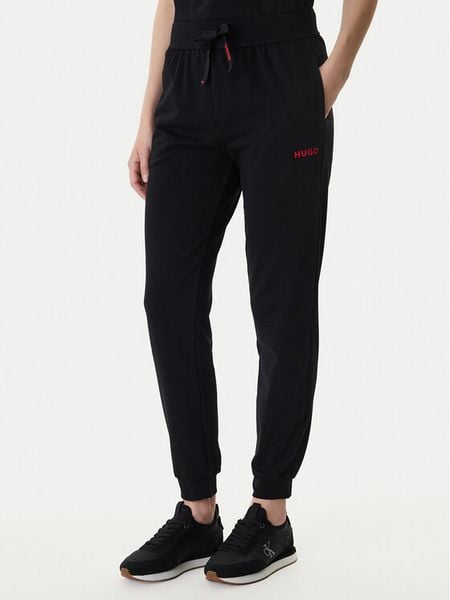 HUGO Spodnie dresowe 50556326 Czarny Regular Fit. Czarne spodnie dresowe damskie Hugo, m, bez wzorów, z bawełny. Za 216.99 zł.