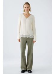 Oui Bluzka w kolorze kremowym rozmiar: 36. Brązowe bluzki damskie Oui, bez wzorów, z koronki, bez kołnierzyka, bez ramiączek. Za 108.74 zł.