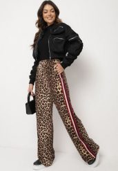 Brązowo-Czerwone Szerokie Spodnie w Panterkę z Wiskozą i Gumką w Talii Ozdobione Lampasami Velonara. Brązowe spodnie materiałowe damskie Born2be, bez wzorów, z jeansu. Za 109.99 zł.