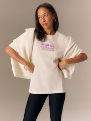 4F T-shirt loose z nadrukiem damski - biały L. Brązowe t-shirty damskie 4F, l, bez wzorów, z materiału, bez kołnierzyka. Za 79.99 zł.