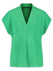 Gerry Weber Koszulka w kolorze zielonym rozmiar: 38. Zielone bluzki damskie Gerry Weber, bez wzorów, bez kołnierzyka, bez ramiączek. Za 92.21 zł.
