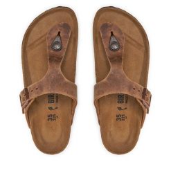 Japonki Birkenstock. Brązowe klapki damskie Birkenstock, bez wzorów, bez obcasa, bez zapięcia. Za 485.99 zł.