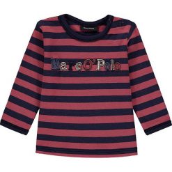 Koszulka w kolorze jasnoróżowo-granatowym. Czerwone koszulki i t-shirty dziewczęce Marc O'Polo Junior, z aplikacjami, z bawełny, z okrągłym kołnierzem, z długim rękawem. W wyprzedaży za 49.95 zł.