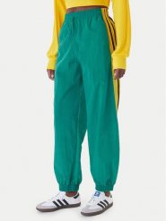 Adidas Spodnie dresowe Sport Santiago KD2971 Zielony Loose Fit. Zielone spodnie dresowe damskie Adidas, l, bez wzorów, z dresówki. Za 349.99 zł.
