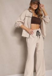 Jasnobeżowy Retro Komplet Dresowy z Wiskozą Bluza i Spodnie o Szerokim Kroju Selriza. Brązowe bluzy damskie Renee, z aplikacjami, z dresówki, bez kaptura. Za 159.99 zł.