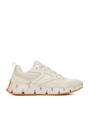 Reebok Sneakersy CEO-ZIG VECTOR AR30153WCQ Beżowy. Brązowe obuwie sportowe damskie Reebok, z materiału, bez zapięcia. Za 299.99 zł.