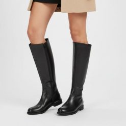 Kozaki damskie Armodo, wysoka cholewka ze skóry naturalnej na zamek na płaskim obcasie, czarne, 70150-S. Czarne kozaki damskie Armodo, na zimę, ze skóry, przed kolano, bez obcasa, na obcasie, bez zapięcia. Za 433.99 zł.