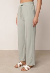 Zielone Szerokie Spodnie z Prążkowanej Tkaniny z Wysokim Stanem Sarora. Zielone spodnie materiałowe damskie Born2be, bez wzorów, z jeansu. Za 59.99 zł.