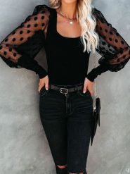 Milan Kiss Bluzka w kolorze czarnym rozmiar: M. Czarne bluzki damskie Milan Kiss, m, bez wzorów, bez kołnierzyka, bez ramiączek. Za 143.56 zł.