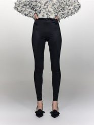 Połyskujące legginsy - czarny. Czarne legginsy damskie Reserved, l, bez wzorów, z dzianiny. W wyprzedaży za 55.99 zł.
