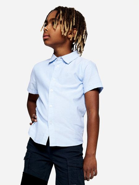 NAME IT Koszula Newsa 13218953 Błękitny Regular Fit. Niebieskie koszule chłopięce Name it, bez wzorów, z bawełny, bez kołnierzyka, bez ramiączek. Za 69.99 zł.