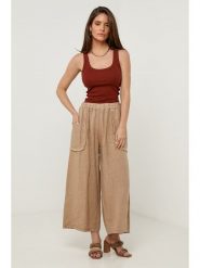 Lin Passion Lniane spodnie w kolorze karmelowym rozmiar: 36/38. Brązowe spodnie materiałowe damskie Lin Passion, bez wzorów, ze lnu. Za 121.99 zł.