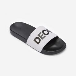Klapki basenowe Decathlon 500 Collector. Czarne klapki damskie NABAIJI, bez wzorów, z materiału, bez obcasa, bez zapięcia. Za 69.99 zł.