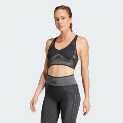 Biustonosz AEROKNIT Training Light Support. Szare biustonosze sportowe damskie Adidas, bez wzorów. W wyprzedaży za 114.50 zł.