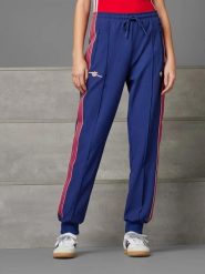 Adidas Spodnie dresowe w kolorze granatowym rozmiar: S. Niebieskie spodnie dresowe damskie Adidas, s, bez wzorów, z dresówki. Za 145.26 zł.