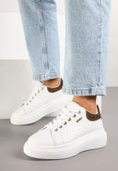 Biało-Brązowe Sneakersy na Niskim Koturnie Zdobione Metalicznymi Wstawkami Alirisa. Białe obuwie sportowe damskie Renee, z jeansu, bez zapięcia. Za 74.99 zł.
