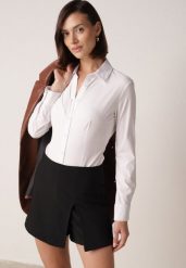 Czarne Spódnico-Szorty z Wysokim Stanem Zdobione Rozcięciem Crethoesa. Czarne szorty damskie Born2be, z aplikacjami, z materiału, z podwyższonym stanem. Za 79.99 zł.