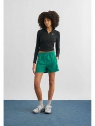 Adidas Szorty sportowe "Originals Firebird" w kolorze zielonym rozmiar: S. Zielone spodenki sportowe damskie Adidas, s, bez wzorów, outdoorowe. Za 109.95 zł.