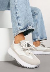 Biało-Beżowe Sneakersy na Grubej Podeszwie z Ozdobnym Paskiem Alutra. Białe obuwie sportowe damskie Born2be, z jeansu, bez zapięcia. Za 99.99 zł.