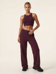 Spodnie wide leg z domieszką wiskozy soft touch Active - czerwony. Czerwone spodnie sportowe damskie Sinsay, l, bez wzorów, z wiskozy. Za 49.99 zł.