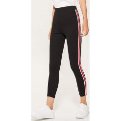 Legginsy z lampasem - Czarny. Czarne legginsy damskie House. Za 69.99 zł.