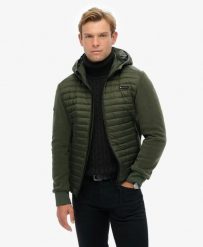Superdry Kurtka Hooded Storm Fleece Hybrid pikowany korpus polarowe rękawy. Zielone kurtki damskie Superdry, s, bez wzorów, z polaru, z kapturem. Za 529.55 zł.