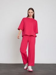 BGN Koszulka w kolorze różowym rozmiar: 38. Różowe koszulki damskie BGN, bez wzorów, z bawełny, bez kołnierzyka, bez ramiączek. Za 65.99 zł.