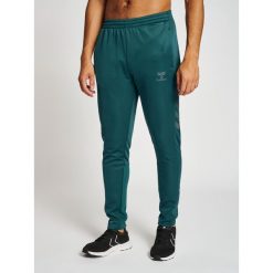 Spodnie dresowe polyesterowe Hummel Core XK. Zielone spodnie dresowe damskie Hummel, xs, bez wzorów, z dresówki. Za 203.50 zł.