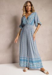Niebieski Kopertowy Kombinezon Bawełniany z Cienkimi Gumeczkami w Pasie Zapinany na Szyi Orithiama. Niebieskie sukienki damskie Renee, bez wzorów, z bawełny, eleganckie, bez ramiączek. W wyprzedaży za 39.99 zł.