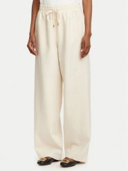 Liu Jo Sport Spodnie dresowe TA6192 T327A Kremowy Loose Fit. Białe spodnie dresowe damskie Liu Jo Sport, l, bez wzorów, z dresówki. Za 689.99 zł.