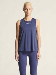 Craft Top sportowy "Core Essence" w kolorze granatowym rozmiar: XL. Niebieskie koszulki sportowe damskie Craft, xl, bez wzorów, z materiału, bez ramiączek, outdoorowe. Za 49.45 zł.