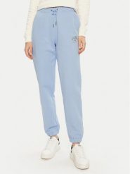 Guess Jeans Spodnie dresowe W5RB63 K68I4 Niebieski Regular Fit. Niebieskie spodnie dresowe damskie Guess Jeans, xl, z aplikacjami, z bawełny. Za 169.99 zł.
