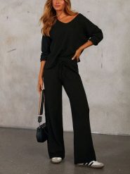 LA Angels 2-częściowy zestaw w kolorze czarnym rozmiar: L. Czarne spodnie materiałowe damskie LA Angels, bez wzorów, z materiału. Za 195.99 zł.