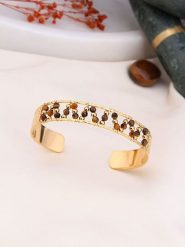 Charlize Pozłacana bransoletka z kryształami rozmiar: onesize. Brązowe bransoletki damskie Charlize, pozłacane. Za 91.56 zł.