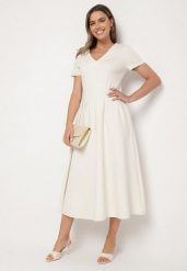 Jasnobeżowa Taliowana Sukienka z Bawełną Zeraviae. Brązowe sukienki damskie Born2be, bez wzorów, z bawełny, klasyczne, bez ramiączek. Za 189.99 zł.