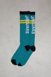 Jacksonville Jaguars - OOSC x NFL Skarpety narciarskie / snowboardowe. Zielone skarpetki damskie OOSC, bez wzorów, z elastanu. Za 132.99 zł.