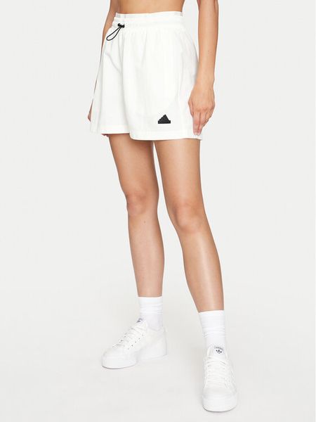 Adidas Szorty sportowe City Escape Woven IW5208 Biały Loose Fit. Białe spodenki sportowe damskie Adidas, xl, bez wzorów, z syntetyku. Za 139.99 zł.