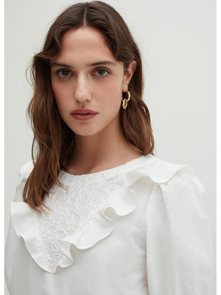 STEFANEL Bluzka w kolorze kremowym rozmiar: 38. Brązowe bluzki damskie Stefanel, bez wzorów, z bawełny, bez kołnierzyka, bez ramiączek. Za 162.87 zł.