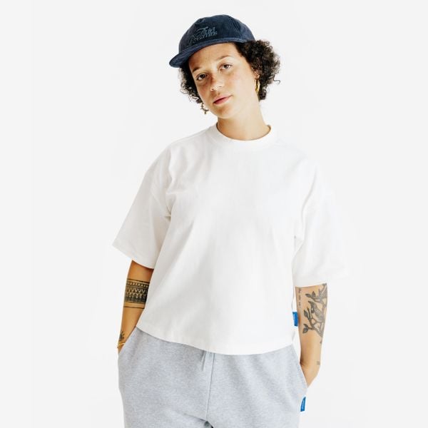 Koszulka Crop damska. Białe koszulki damskie Decathlon, xs, bez wzorów, z bawełny, bez kołnierzyka, bez ramiączek. Za 54.99 zł.