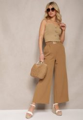 Brązowe Spodnie z Szerokimi Nogawkami w Stylu Palazzo High Waist z Gumką w Pasie z Ozdobnym Elementem Ellsiana. Brązowe spodnie materiałowe damskie Renee, bez wzorów, z bawełny. Za 49.99 zł.