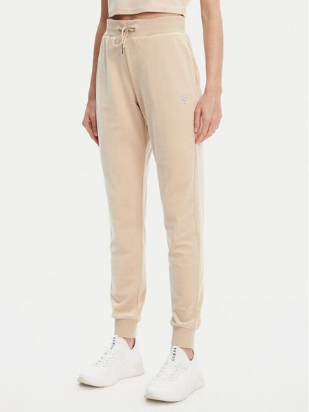 Guess Spodnie dresowe V3BB27 K0232 Beżowy Regular Fit. Brązowe spodnie dresowe damskie Guess, s, z aplikacjami, z dresówki. Za 189.99 zł.