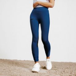 Legginsy damskie Fouganza 100 light. Niebieskie legginsy damskie FOUGANZA, s, bez wzorów, z materiału. W wyprzedaży za 79.99 zł.