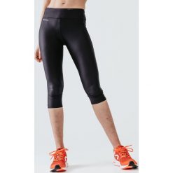 Legginsy do biegania krótkie damskie Kiprun Run 100. Czarne legginsy damskie KALENJI, xs, bez wzorów, z elastanu. W wyprzedaży za 39.99 zł.
