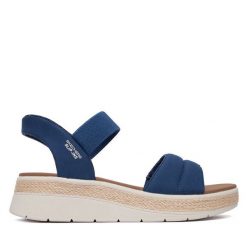 Sandały Skechers. Niebieskie sandały damskie Skechers, bez wzorów, bez obcasa, na płaskiej podeszwie, bez zapięcia. Za 289.99 zł.