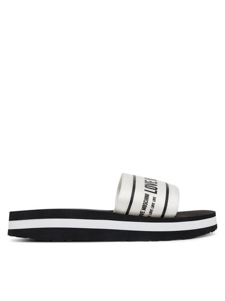LOVE MOSCHINO Klapki JA28334G0MIX6100 Biały. Białe klapki damskie Love Moschino, bez wzorów, z materiału, bez obcasa, bez zapięcia. Za 539.99 zł.