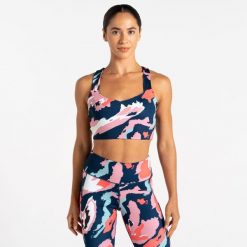 Biustonosz sportowy damski Swift. Białe biustonosze sportowe damskie Dare 2b, bez wzorów, z elastanu. W wyprzedaży za 139.99 zł.
