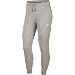 Spodnie sportowe damskie Nike Essential Pant Reg Fleece. Szare spodnie sportowe damskie Nike, m, bez wzorów, z dresówki. Za 302.00 zł.