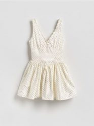 Kombinezon z bawełną - złamana biel. Kombinezony damskie Reserved, bez wzorów, z bawełny, bez kołnierzyka, bez ramiączek. Za 159.99 zł.