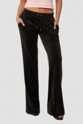 JUICY COUTURE Czarne spodnie dresowe damskie Layla Low Rise. Czarne spodnie dresowe damskie Juicy Couture, s, bez wzorów, z dresówki. W wyprzedaży za 331.99 zł.
