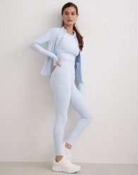 Damskie leginsy wysoki stan, squat proof, szybkoschnące Sense aura. Niebieskie legginsy sportowe damskie Aim'n, s, bez wzorów, z elastanu, z podwyższonym stanem, na fitness i siłownię. Za 296.00 zł.